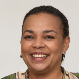 Joyful white adult female with short  brown hair and brown eyes