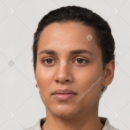 Neutral latino young-adult female with short  black hair and brown eyes