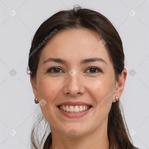 Joyful white young-adult female with long  brown hair and grey eyes