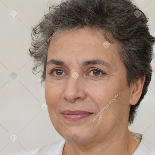 Joyful white adult female with short  brown hair and brown eyes