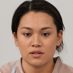 Neutral asian young-adult female with medium  brown hair and brown eyes