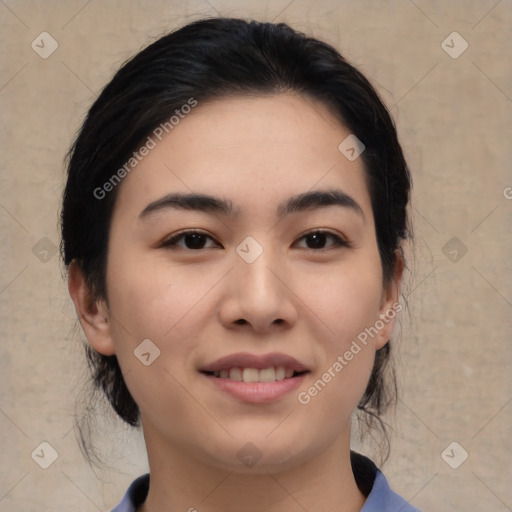 Joyful asian young-adult female with medium  black hair and brown eyes