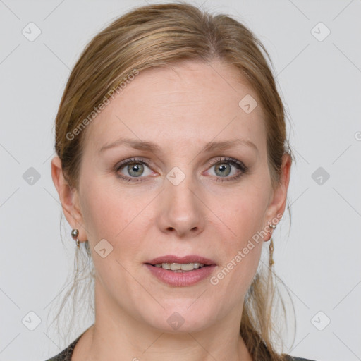 Joyful white young-adult female with medium  brown hair and blue eyes