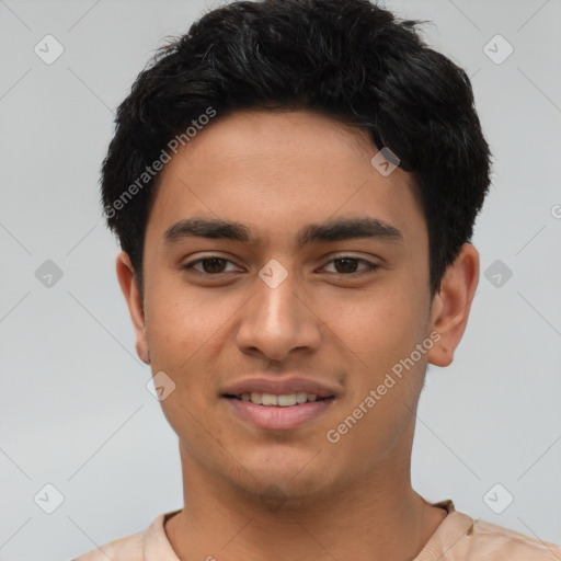 Joyful latino young-adult male with short  black hair and brown eyes