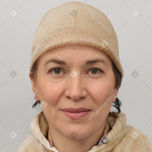 Joyful white adult female with short  brown hair and brown eyes