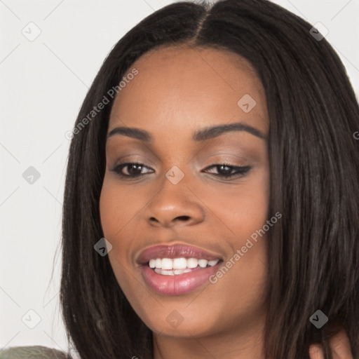 Joyful latino young-adult female with long  black hair and brown eyes