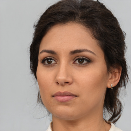 Neutral white young-adult female with medium  brown hair and brown eyes