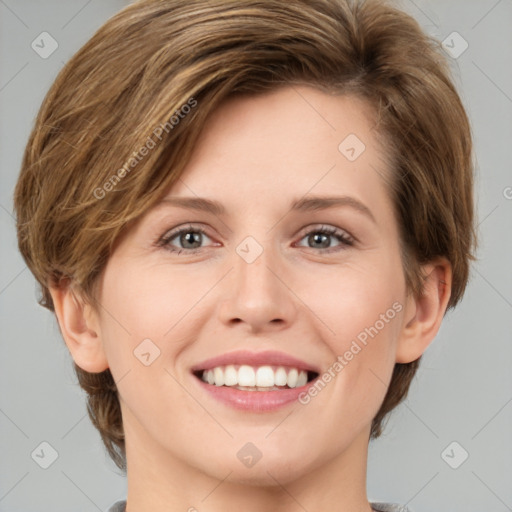 Joyful white young-adult female with medium  brown hair and green eyes