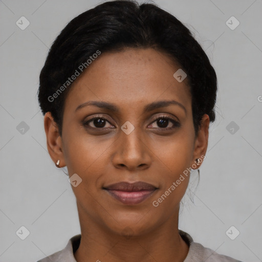 Joyful latino young-adult female with short  black hair and brown eyes