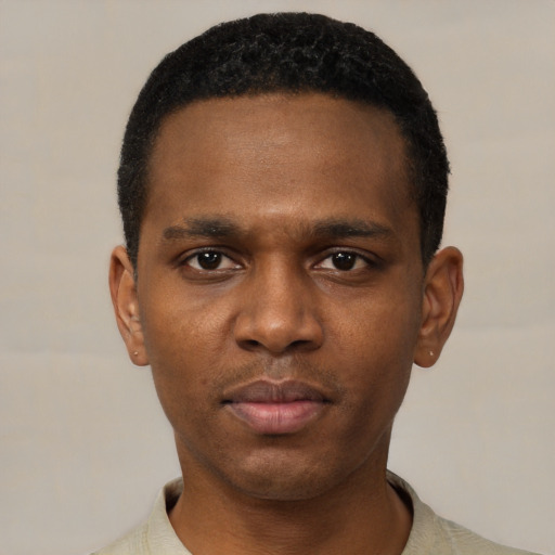 Neutral black young-adult male with short  black hair and brown eyes