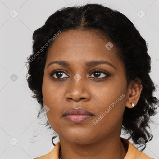 Joyful black young-adult female with medium  black hair and brown eyes