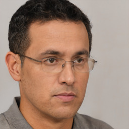 Neutral white adult male with short  brown hair and brown eyes