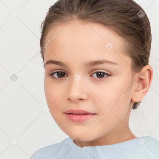 Joyful white child female with short  brown hair and brown eyes