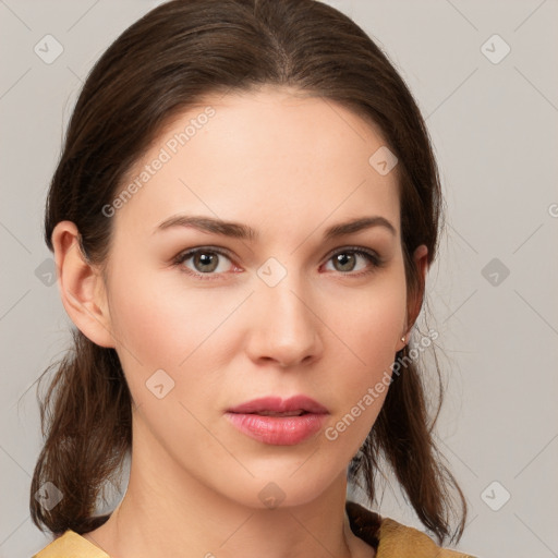 Neutral white young-adult female with medium  brown hair and brown eyes