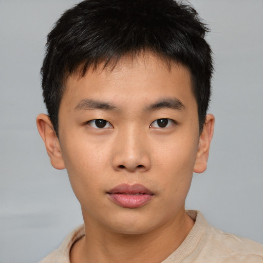 Neutral asian young-adult male with short  brown hair and brown eyes