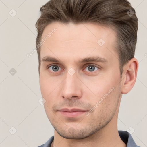 Neutral white young-adult male with short  brown hair and grey eyes