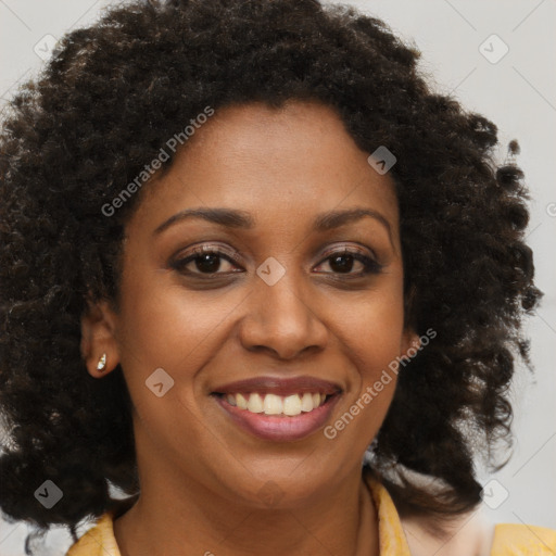 Joyful black young-adult female with medium  brown hair and brown eyes