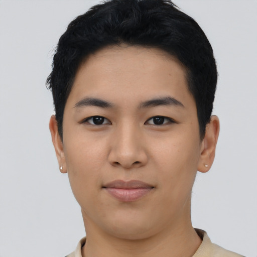 Joyful asian young-adult female with short  black hair and brown eyes