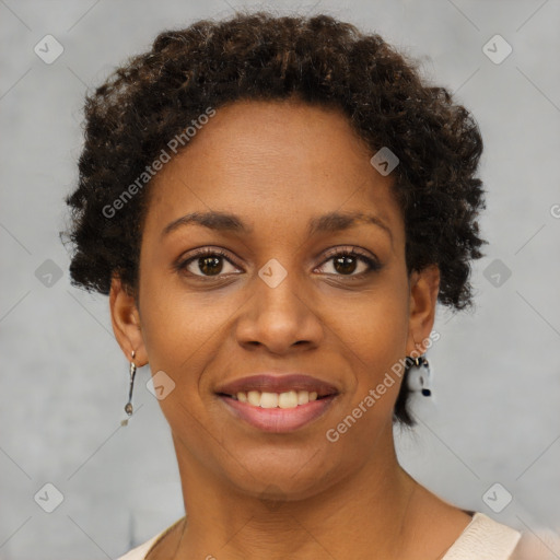 Joyful black young-adult female with short  brown hair and brown eyes