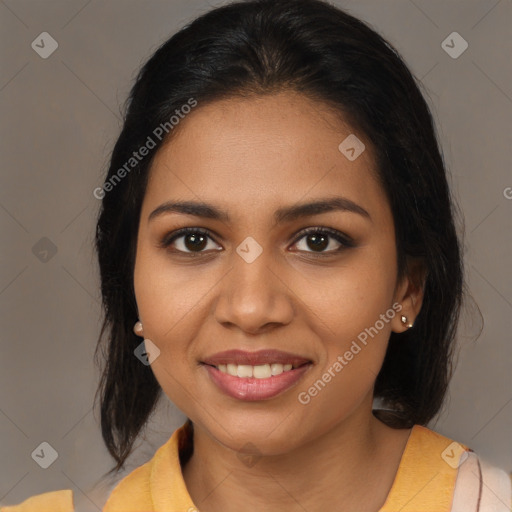 Joyful latino young-adult female with medium  brown hair and brown eyes