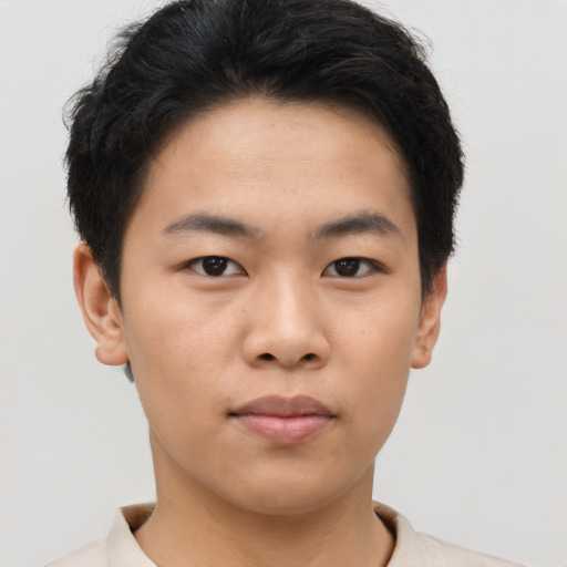 Neutral asian young-adult male with short  brown hair and brown eyes