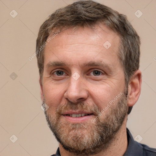 Neutral white adult male with short  brown hair and brown eyes