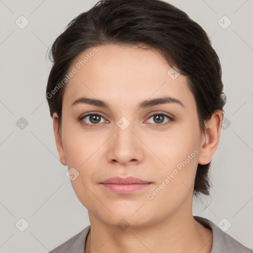 Neutral white young-adult female with short  brown hair and brown eyes