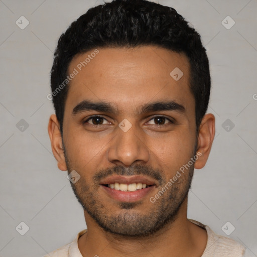 Joyful latino young-adult male with short  black hair and brown eyes