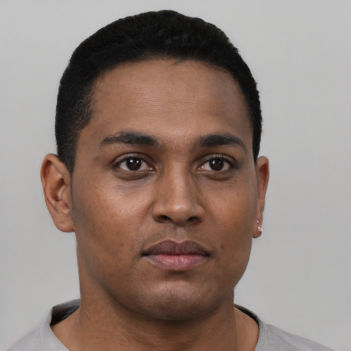 Neutral black young-adult male with short  black hair and brown eyes