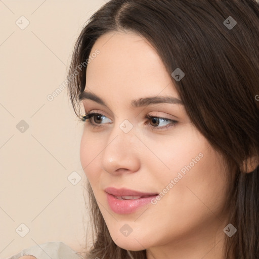 Neutral white young-adult female with long  brown hair and brown eyes