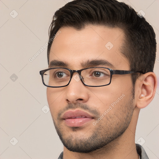 Neutral white young-adult male with short  brown hair and brown eyes