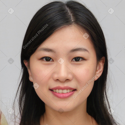 Joyful asian young-adult female with long  brown hair and brown eyes