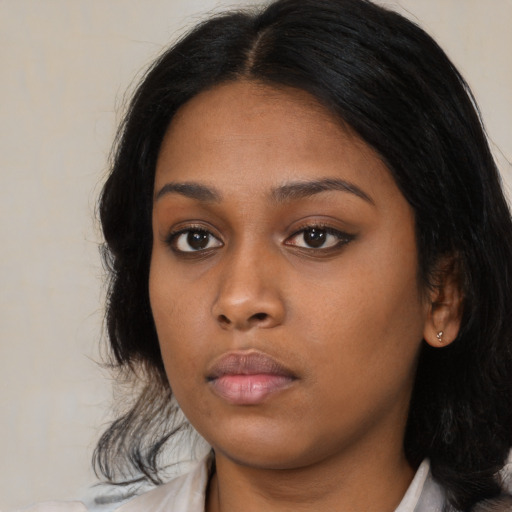 Neutral asian young-adult female with medium  black hair and brown eyes