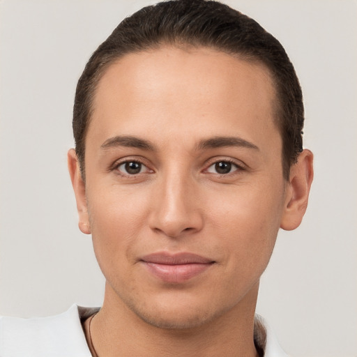 Joyful white young-adult female with short  brown hair and brown eyes