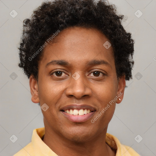 Joyful black young-adult male with short  brown hair and brown eyes