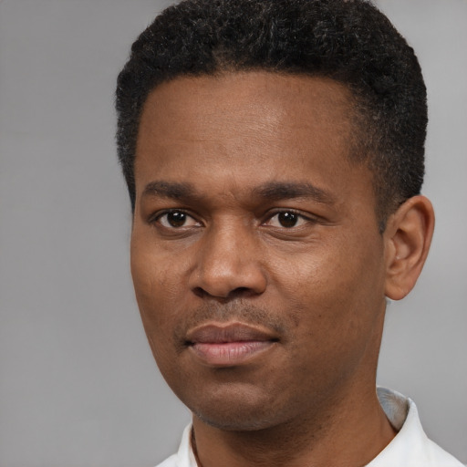 Neutral black young-adult male with short  black hair and brown eyes