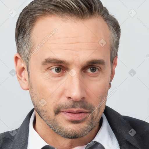 Neutral white adult male with short  brown hair and brown eyes