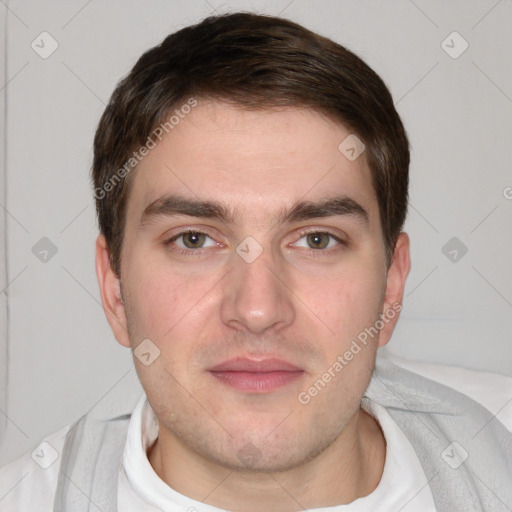 Neutral white young-adult male with short  brown hair and brown eyes