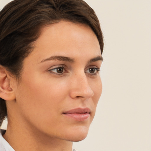 Neutral white young-adult female with medium  brown hair and brown eyes