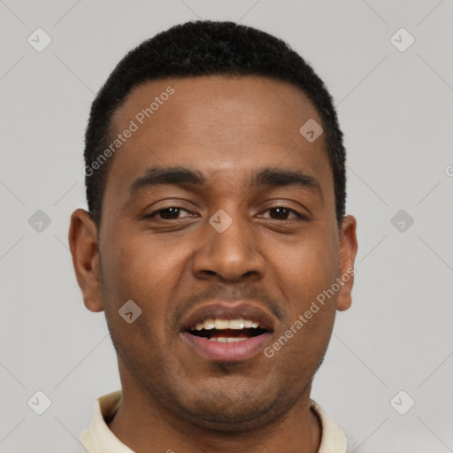Joyful black young-adult male with short  black hair and brown eyes