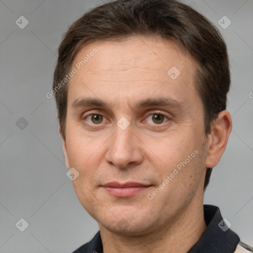 Joyful white adult male with short  brown hair and brown eyes