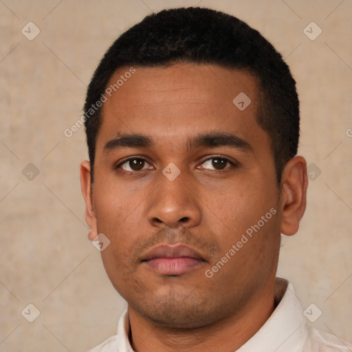 Neutral latino young-adult male with short  black hair and brown eyes