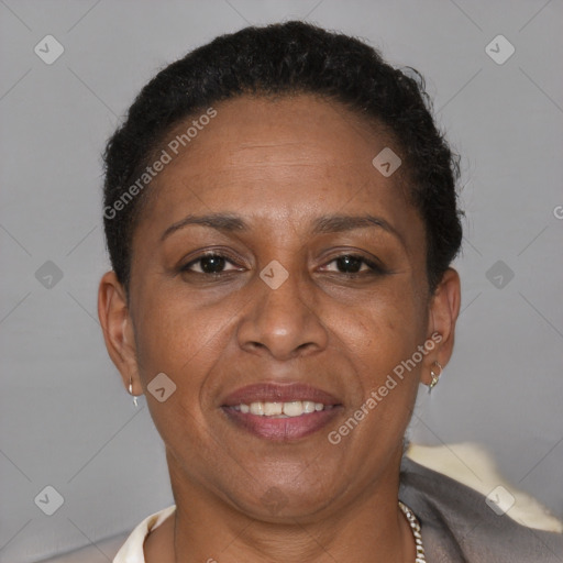 Joyful latino adult female with short  brown hair and brown eyes