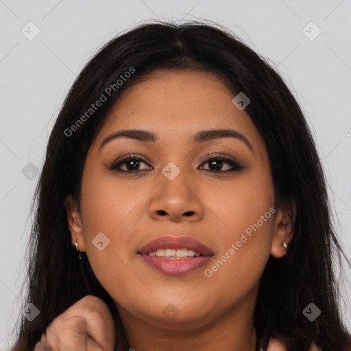 Joyful latino young-adult female with long  brown hair and brown eyes