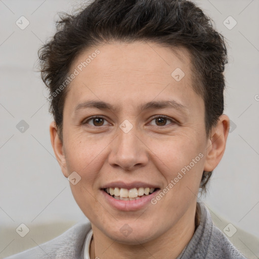 Joyful white adult female with short  brown hair and brown eyes