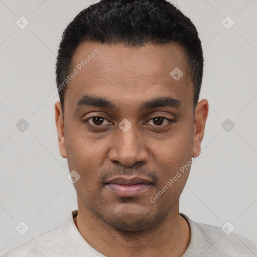 Neutral latino young-adult male with short  black hair and brown eyes