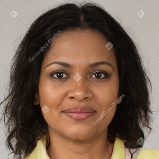 Joyful black adult female with medium  brown hair and brown eyes