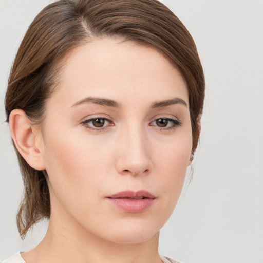 Neutral white young-adult female with medium  brown hair and grey eyes