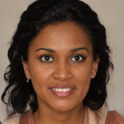 Joyful black young-adult female with medium  brown hair and brown eyes