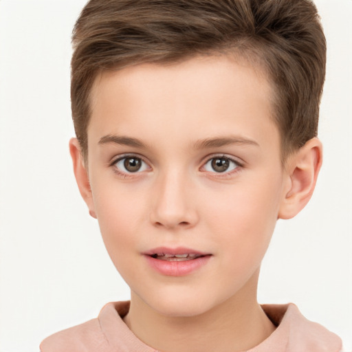 Joyful white child male with short  brown hair and brown eyes